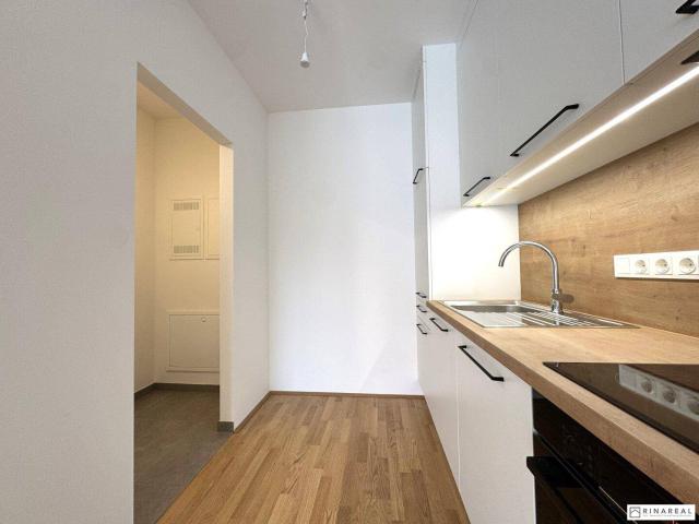 SCHULGARTENGASSE | Erstbezug Gut geschnittene 2 Zimmer Wohnung | Loggia | Einbauküche | Elektr. Beschattung | Optional: Tiefgaragenstellplatz