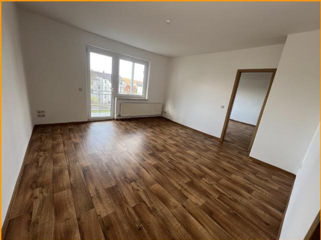 Schicke 3 Raum Wohnung mit modernem Bad, Balkon und Gartennutzung in ruhiger Anliegerstraße!