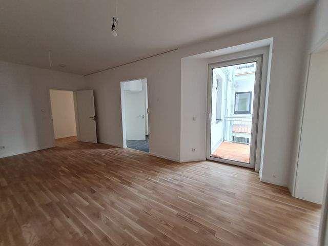 Schicke 3 Zimmerwohnung mit Parkett, Balkon, Einbauküche u. guter Energieeffizienz
