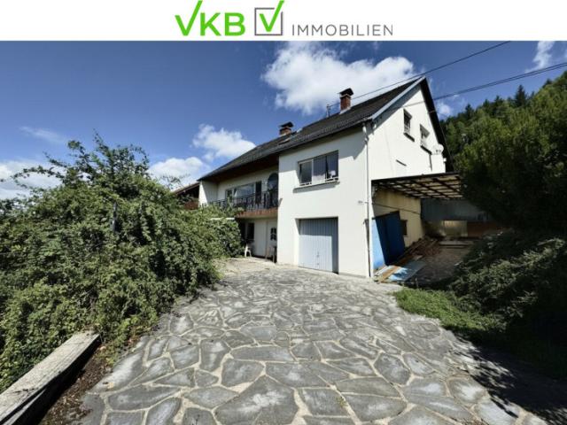 SCHLÜßLBERG | STRAßFELD: Idyllisches Zweifamilienhaus mit großzügigem, sonnigem Garten und beeindruckendem Fernblick!