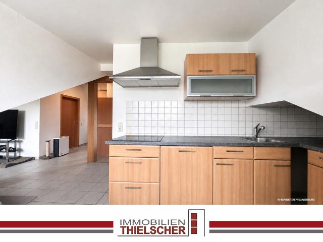 Schöne 2 Zimmer Dachgeschosswohnung mit Garage in bevorzugter Lage von Übach Palenberg