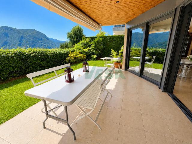 Schöne 6,5 Zimmer Wohnung mit privatem Garten in ruhiger Hanglage