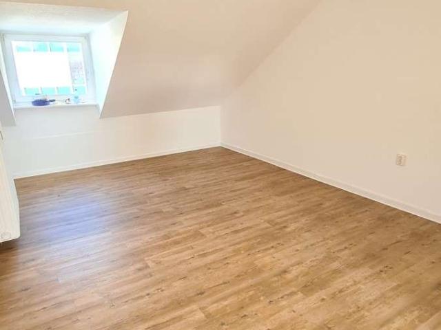 Schöne Dachgeschosswohnung mitten in der City!