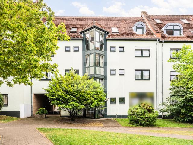 Schöne Eigentumswohnung mit Fußbodenheizung, Balkon und Tiefgaragenstellplatz