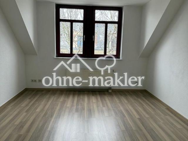 Schöne, zentral gelegene und helle DG Wohnung