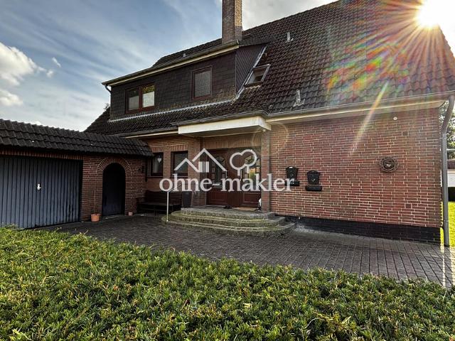 Schönes Zweifamilienhaus mit vermietetem Dachgeschoss in Burweg Bossel