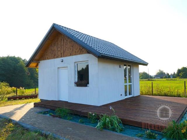 Nowoczesny dom 152m2 z materiałami i działkami w Santocku