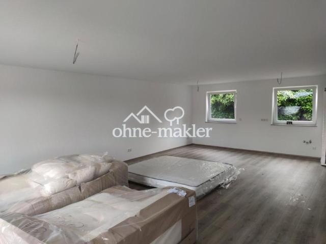 Sanierte 4 Zimmer Erdgeschosswohnung mit großem Balkon und Gartenbereich