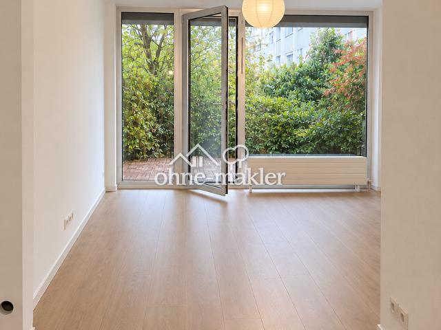 Sanierte 2 Zimmer Wohnung mit Terrasse, neuer Küche und TG Stellplatz