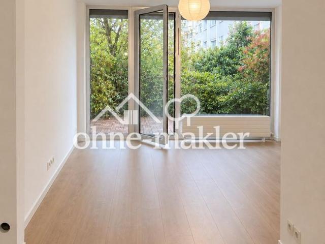 Sanierte 2 Zimmer Wohnung mit Terrasse, neuer Küche und TG Stellplatz