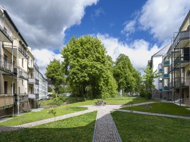 Sanierte 2 Zimmer Wohnung im Lindenhof – Fußbodenheizung, Balkon und Parkettboden!
