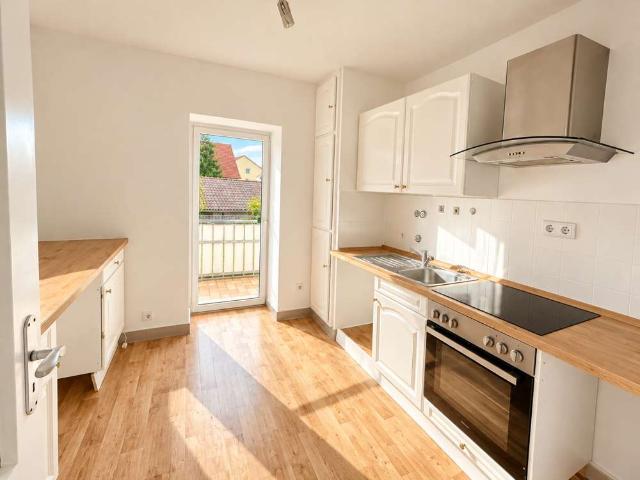 Sanierte 3 Zimmer Wohnung mit Balkon & Gemeinschaftsgarten. 2 Kaltmieten Geschenkt