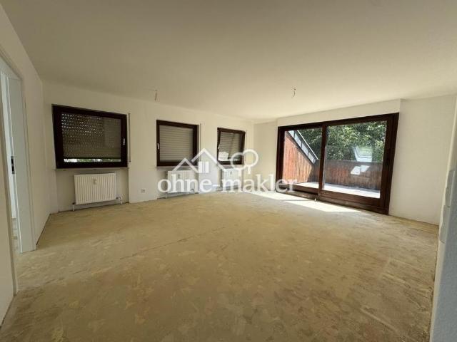 Sanierte 3 Zimmer Dachgeschosswohnung mit Dachterrasse und Tiefgaragenplatz