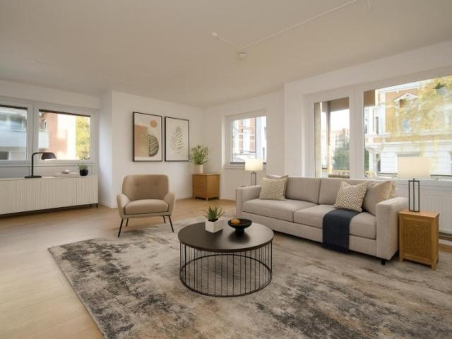 Sanierte 3 Zimmerwohnung mit Balkon & Tiefgarage