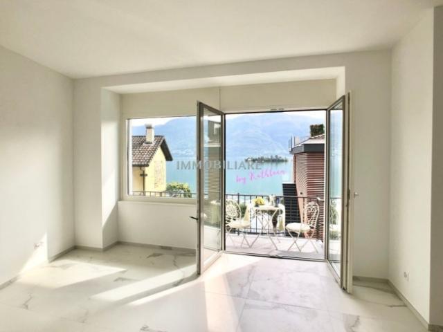Sanierte Wohnung mit Seeblick und Garage, Seezugang öffentl. gegenüber | Appartamento ristrutturato con vista lago e garage, accesso pubblico al lago di fronte Fe