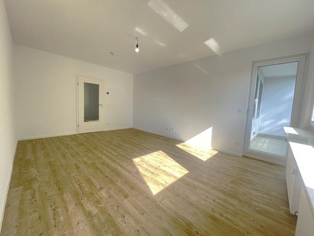 sanierte Erdgeschosswohnung mit Balkon