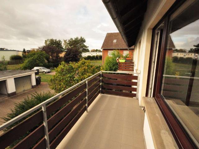 Sanierte helle Wohnung im OG mit Süd Balkon und Garage