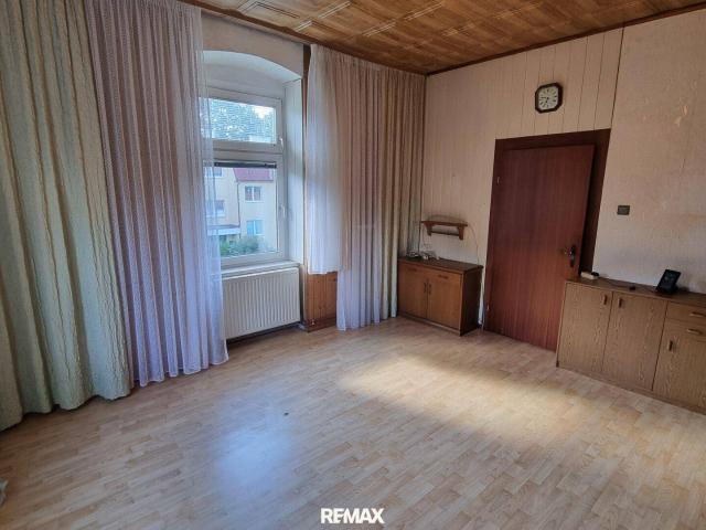 Sanierungsbedürftige 2 Zimmer Eigentumswohnung mit Garten