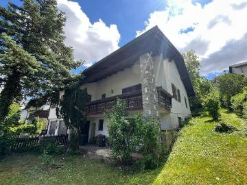 Einfamilienhaus mit Doppelgarage und charmantem Garten