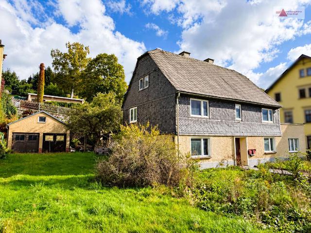 Sanierungsbedürftiges Einfamilienhaus in Gelenau kaufen – Fachwerkhaus mit Garten und Doppelgarage