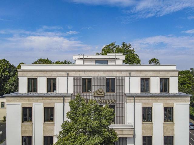 Sanierungsbedürftiges Mehrfamilienhaus 890 m² Wohnfläche