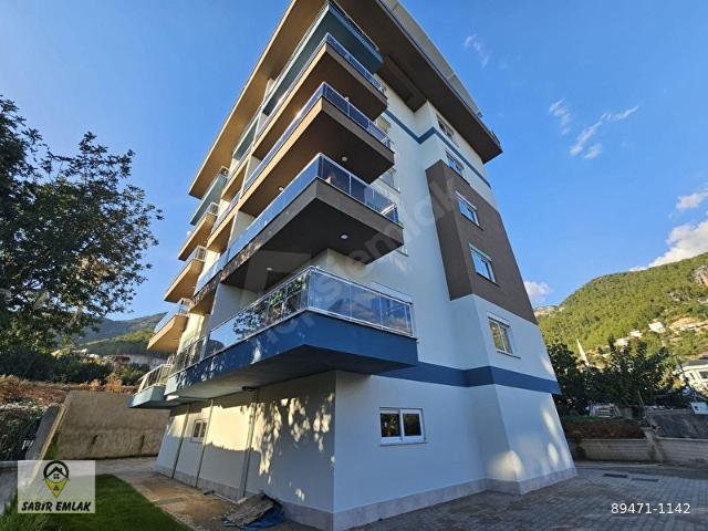 SABİR EMLAKTAN ALANYA ACİL SATILIK 2+1 UYGUN FİYATA YENİ BİNADA