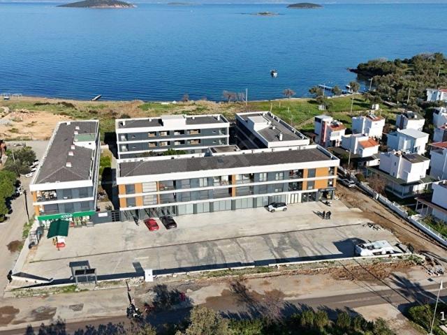 SAHİLKENTTE,KONSEPT PROJE DENİZ MANZARALI BODRUM EKLENTİLİ 1+1