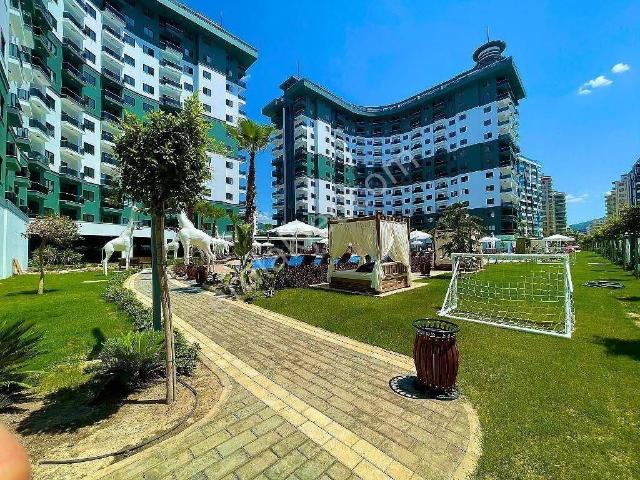 Sahile 550m Otel Konseptli Serenity Residence`de 1+1daire| Tekce