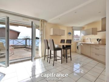 SAINT GENIS LES OLLIERES Appartement T3 avec grande terrasse, garage et cave