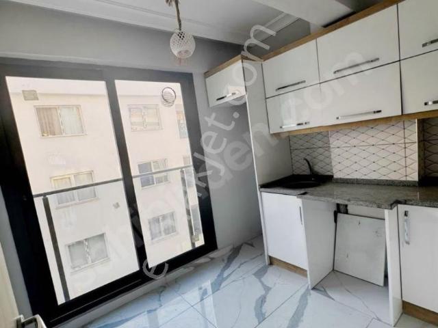 Salihli Berkay Emlaktan Acısu Caddesi Üzerinde Satılık 2+0 Doğalgazlı Daire