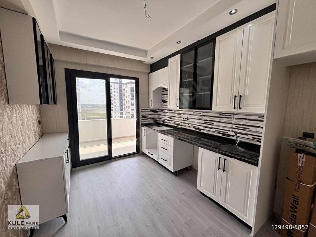 SARIÇAM BELEDİYE CİVARI CADDE ÜZERİ 3+1 K.MUTFAK LÜX İŞÇİLİKLİ