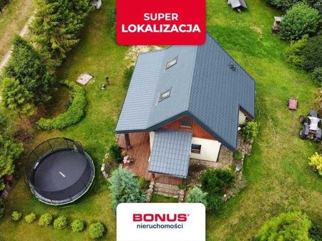 Urokliwy dom nad morzem z dużą działką w Sasinie