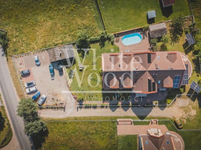Sprzedam obiekt komercyjny 856 m² z basenem i pokojami gościnnymi