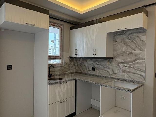 SATILIK 1+1 PELİTKÖY'DE SIFIR TRAMVAYA YAKIN DAİRE