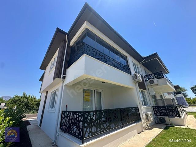 Ortaca Arıkbaşında Yüzme havuzlu Eşyalı 2+1 giriş kat yeni daire satılık