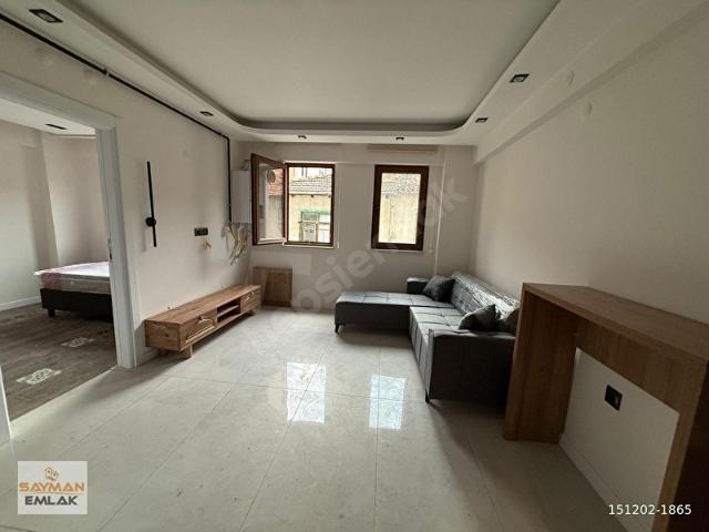 SAYMAN'DAN MERKEZDE KİRALIK EŞYALI SIFIR LÜKS 1+1 DAİRE