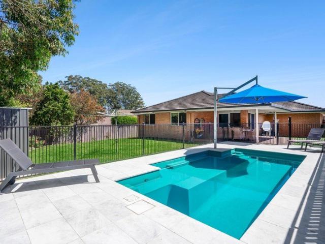 Seamless Family Living from Inside to Poolside