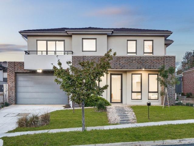 Seamless modern living with double level townhouse appeal