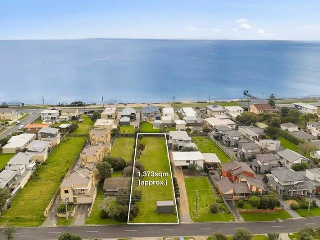 Seaside Opportunity with Plans & Permits for Five Townhomes