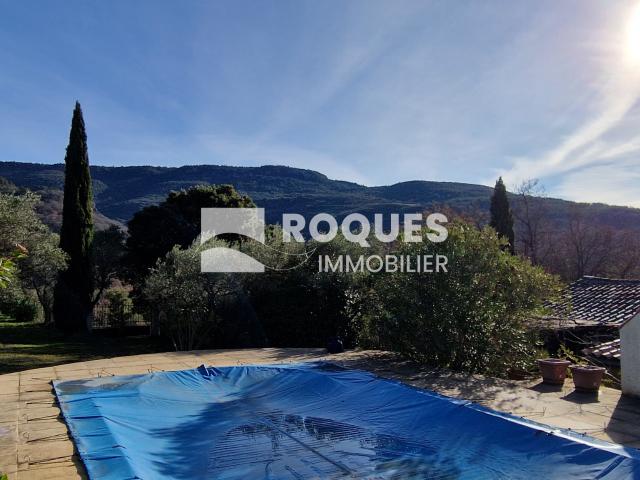 Secteur Lodève, Maison en pierre plus terrain et Piscine à Vendre