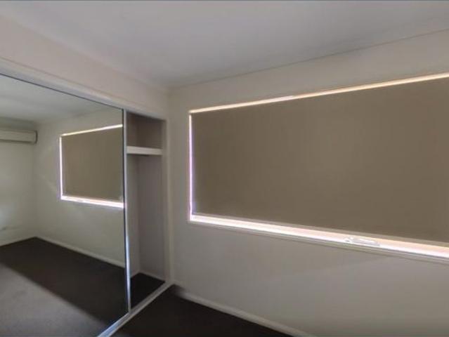 Secure 2BR Townhouse – Water Included & Walking distance to train, bus stations, shopping centers and flood free zone