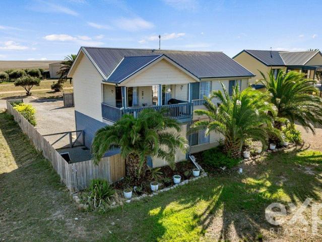 Secure Coastal Living with Magnificent Views in Palm Cove Estate