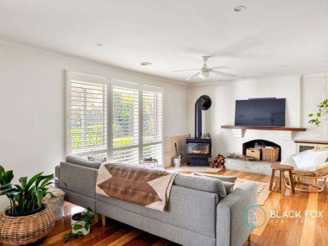Secure Coastal Sanctuary with Garden Bliss