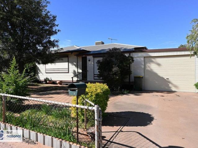 Secure & Convenient Family Living or Neat & Tidy Investment Property