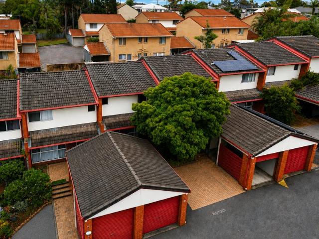 SECURE GATED TOWNHOUSE WITH POOL PRIME WOODRIDGE LOCATION!