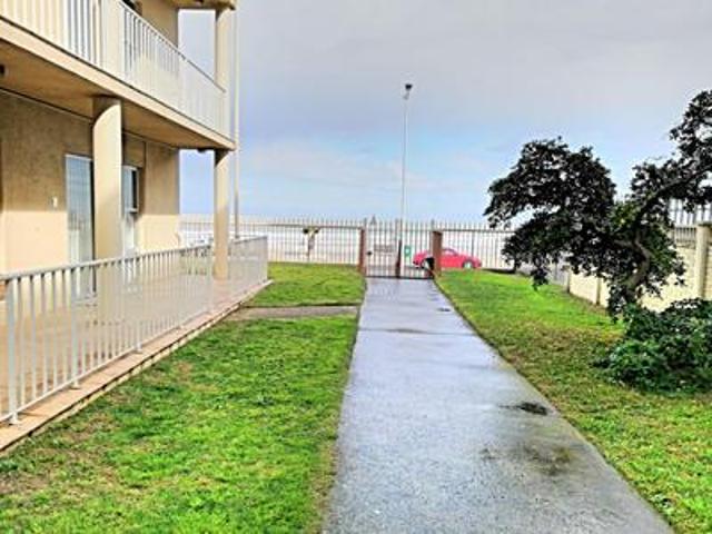 secure large 3 bedroom beachfront ap.