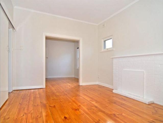 Secure & Spacious updated family home with loads of storage and space!