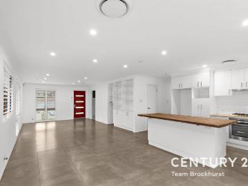 SECURE, STYLISH AND STEPS FROM THE COAST