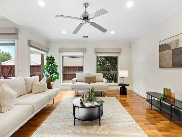 Secure, Stylish & Superbly Located Executive Town Home!