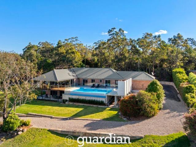 Secluded Acreage Paradise with Stunning Bush Views